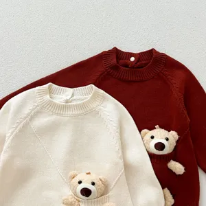 Cute infant baby knit romper detail, long sleeve bear bodysuit design for autumn wear.