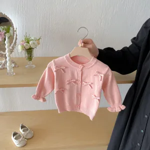 Cute baby girl pink knit cardigan with sweet bows, long sleeve button sweater top for autumn.