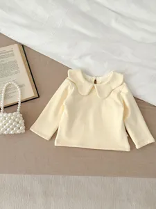 Cozy cream baby girl long sleeve blouse with sweet peter pan collar minimalist style top