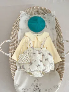Detailed view of Korean style baby winter floral romper set with cute collar and cozy texture.