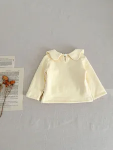 Cute baby toddler yellow long sleeve top with sweet doll collar clothing detail view