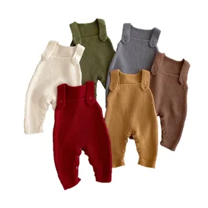 Cute knitted baby romper set with shoulder straps and buttons, perfect autumn daily wear for infants.