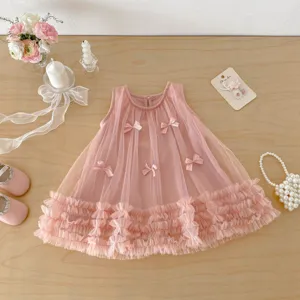 Pink toddler mesh princess dress detail, sleeveless design with cute bows and ruffled hem.