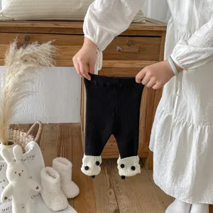 Baby Kleinkind Strick Leggings schwarze Hose mit weißen Bommel Bündchen süße Winter Kinder