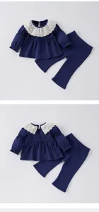 Toddler girls spring clothing set featuring a cute lace collar doll shirt and matching pants.