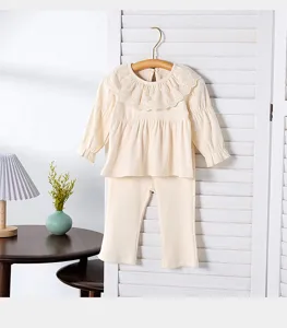 Cute toddler girls spring outfit set, lace collar doll shirt and wide leg pants for kids.