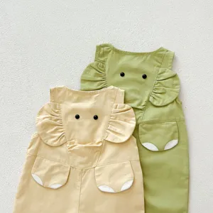 Detailed view of cute toddler baby cotton overalls with sweet candy colors and lovely ruffle shoulders.