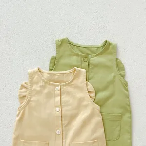 Detailed view of cute baby sleeveless cotton rompers with front buttons in pastel colors.