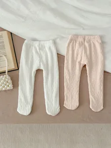 Cozy baby fleece-lined footed tights in white and pink, soft cotton warm infant leggings.