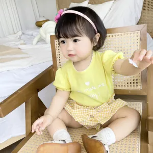 Camiseta amarilla de manga corta para niña pequeña y pantalones cortos a cuadros ropa de verano