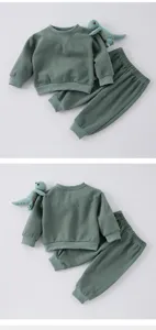 Toddler dinosaur plush sweatshirt and sweatpants set, comfortable green cotton children's clothing.