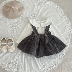 Infant baby girl corduroy floral overall dress set with blouse, hat and shoes detail view.