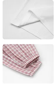 Primo piano dei dettagli di abbigliamento per bambini, cuciture e polsini a quadri.