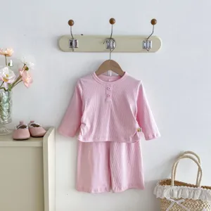 Ensemble deux pièces haut à manches longues et short côtelé rose bébé fille