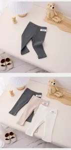 Infant ribbed leggings for babies, soft solid color cotton tight pants, comfortable fall wear.