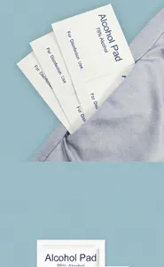 Close-up view of 75% alcohol pads in foil packaging showing portable use in a pocket