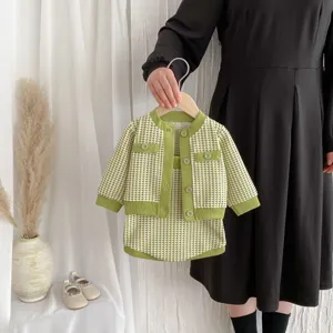 Detailed view of the baby toddler knit cardigan and shorts set in a chic tweed style.
