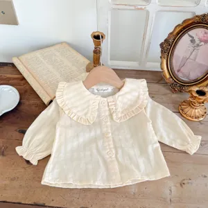 Infant baby girl white long sleeve blouse featuring cute ruffled collar and sweet style top.