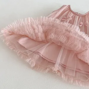 Girls pink mesh princess dress detail, cute sleeveless tutu with 3D bows for summer.