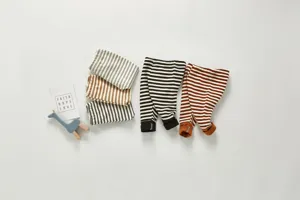 Infant striped cotton pants detail, soft breathable fabric with cute stripe designs, comfortable waist.