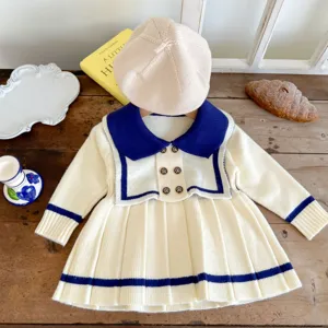 Detailed view of the cute girls sailor knit dress and matching beret detail showcase.