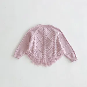 Chic pink knit cardigan for toddler girls featuring elegant diamond patterns and stylish fringe hem.