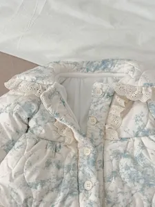 Thickened baby winter padded coat with floral print, cute lace lapel collar and button closure.