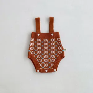 Knit baby romper featuring geometric patterns, straps and front buttons, cozy winter infant clothing.