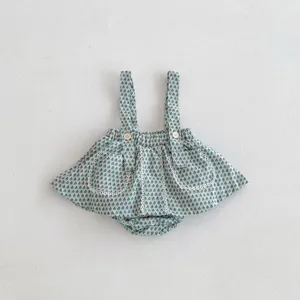 Infant baby girl cute floral print suspenders romper dress with delicate white lace trim details.