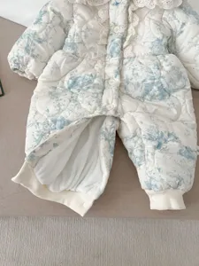 Baby winter thick warm romper detail view, sweet lace collar and cute blue print design.