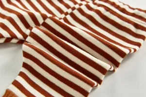 Brown white striped baby cotton pants detail view, soft knitted fabric for infant toddler kids.