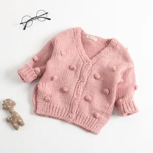 Schattig roze gebreid vest voor baby's met pompons handgemaakte peuter trui.