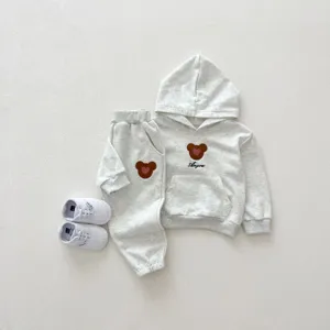 Cute baby cotton hooded sweatshirt and pants set with adorable bear embroidery for autumn wear.