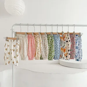 Cute floral baby anti-mosquito pants detail, lightweight breathable summer infant trousers.