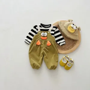 Cute baby autumn outfit set including striped shirt, green corduroy overalls, hat, and shoes.