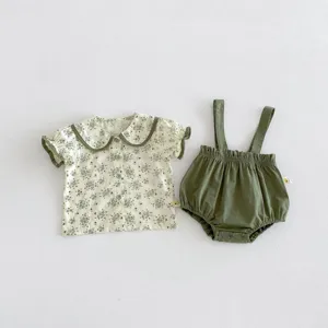 Cute baby girls floral doll collar top and green strap bloomers summer clothing set.