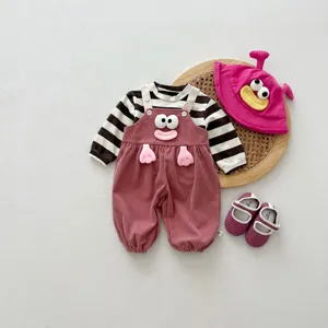 Detailed view of cute baby autumn outfit set with striped shirt and pink plush overalls.