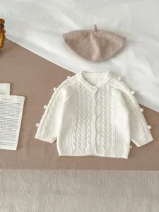 Schattig baby gebreid vest met pompons en baret, gezellige kabelsteek trui voor peuters en baby's.