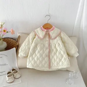 Adorable toddler girls quilted winter coat with pink collar and buttons, warm and stylish jacket.