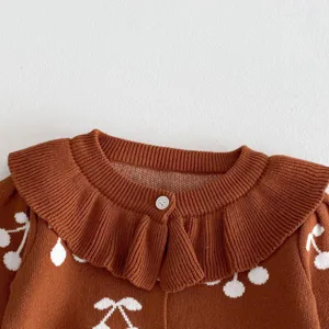 Infant baby girls knit cardigan sweater detail, cute cherry print and ruffled collar design.