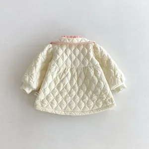 Toddler girl quilted winter jacket with pink ruffle collar, warm and stylish cotton coat top.