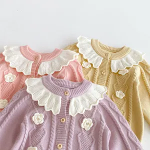 Chic baby knit cardigan featuring a sweet lotus leaf collar and hand-crocheted flowers for autumn.
