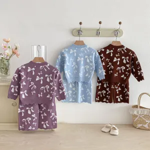 Kids knitwear set girls long sleeve sweater and shorts with cute bow jacquard design aesthetic.