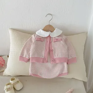 Cute baby pink plaid cardigan and romper set, cozy infant autumn clothing with white collar.