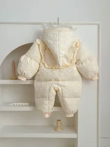 Infant winter duck down romper detail, cute floral embossed pattern with hooded design.