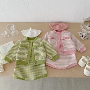Infant baby girls autumn knit cardigan coat and strap skirt set with beret hat detail view.
