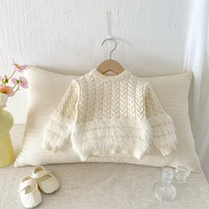 Baby cable knit sweater with plush hem detail, cozy long sleeve winter baby apparel.