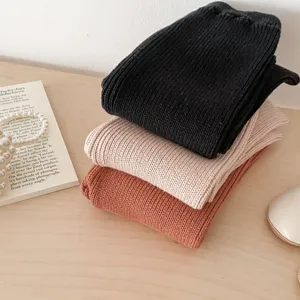Detailed view of baby knitted ribbed pants soft cotton casual toddler leggings set