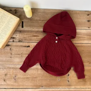 Red cable knit hooded baby poncho, cute toddler winter pullover cape, cozy knitwear.