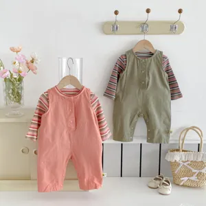 Adorable baby spring outfit set featuring striped long sleeve shirt and solid wide strap overalls.